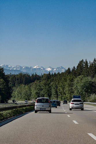 Highway in the Czech Republic with forest and mountain scenery in the background